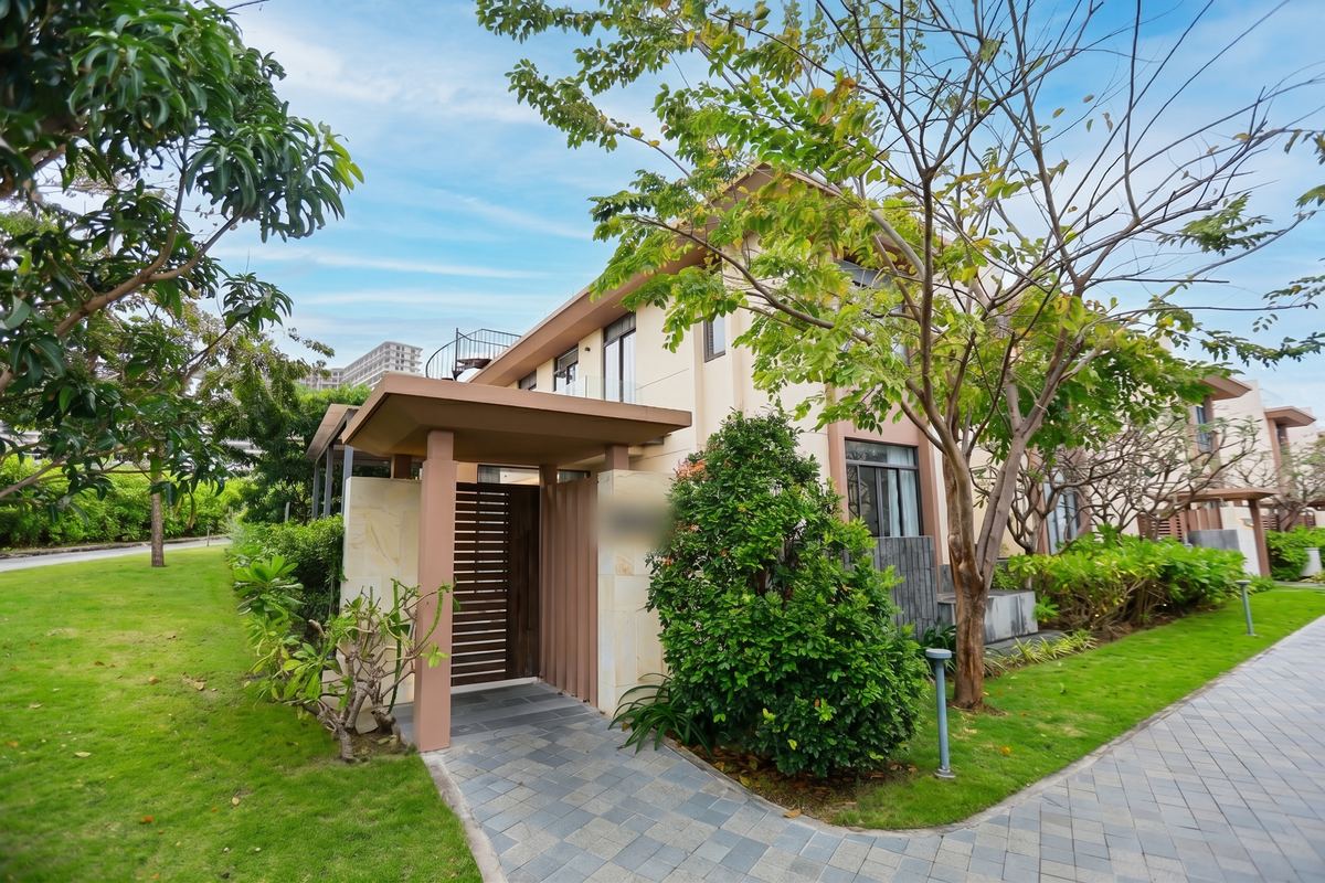 Garden Pool Villa exterior surrounded by tropical gardens